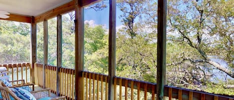 Enjoy water views from screened in porch