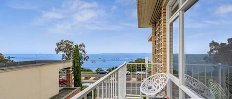 Sit back and relax on your private balcony with stunning views across the water