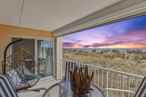 Elegant and luxurious 2 bed/2 bath first level condo nestled in the dunes; beachfront!!