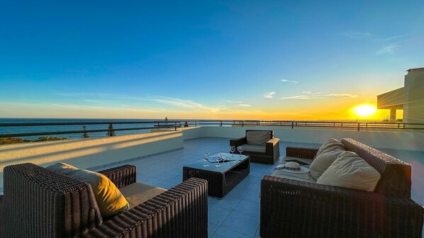 Terrace Sitting Area with Stunning Sunset Sea Views