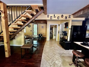Unwind in the rustic ambiance of the cabin's comfortable and welcoming interior.