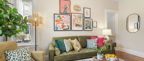 Enjoy all the handpicked art in this colorful living room