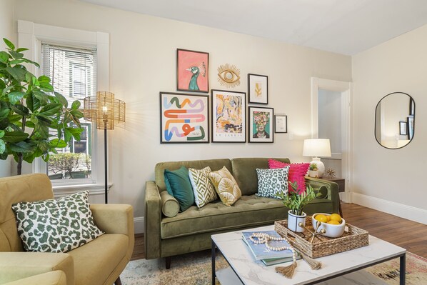 Enjoy all the handpicked art in this colorful living room