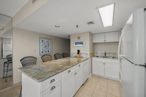 An updated kitchen makes preparing meals a breeze.