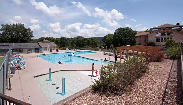 This large and fun pool has an adjacent hot tub and indoor pool. 