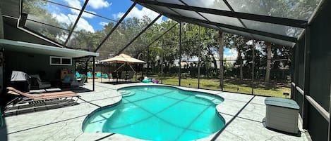 Pool, with outdoor grill.