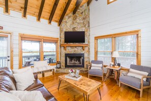 Living room with wood burning fireplace