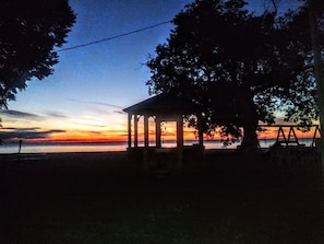 Just the right spot, our gazebo sits where the grass line meets the shoreline.