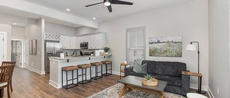 Spacious and open living, dining and kitchen spaces with lots of bright light.
