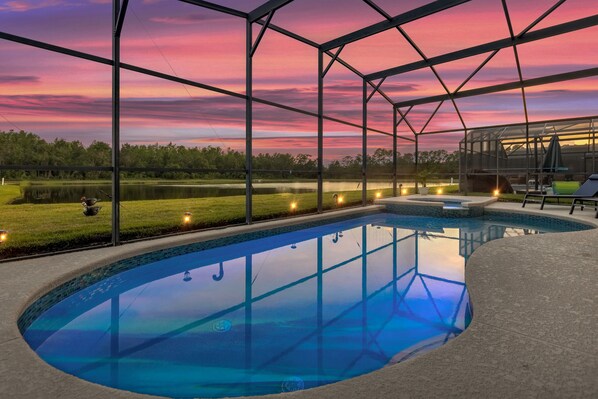 Enjoy the pool with its stunning view of the lake. 