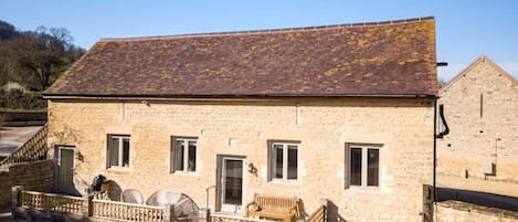 Beautiful Cotswold stone farm building recently renovated. With a large patio.