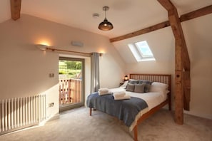 Comfy en suite bedrooms with original exposed beams