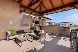 Plenty of seating area to entertain friends and familyDoors open up interior space into the outdoors