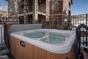 Hot tub is located right outside of the building (free)
