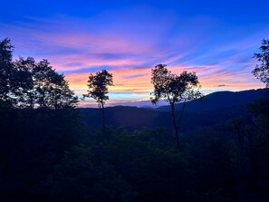 The sunsets are captivating over the mountains!  Enjoy the views from both decks. 