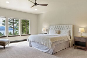 19. Masters Bedroom with king size bed,  and lake view