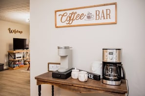 Start your day right with our coffee bar featuring both Cuisinart and Keurig machines.