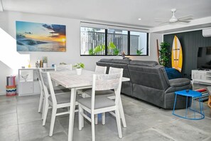 Dining room, with lounge room beyond