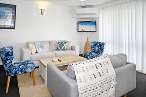 Lounge 1, with smart tv allowing you to view your own streaming services, or watch free to air TV