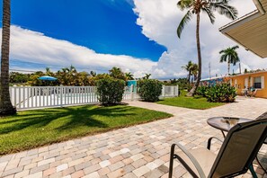 Pool view from outdoor patio seating area