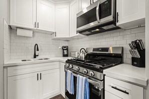 The kitchen is equipped with everything you need!  We have dish ware, silverware, oven, microwave, fridge, cook stove, knife set, coffee maker and a lot of storage space! 