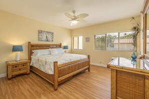 Large bedroom with plush Cal King Bed