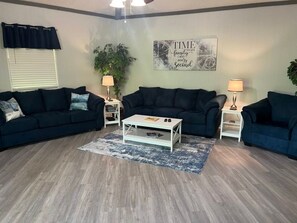 Three Full Size Sofas and a Comfy Chair