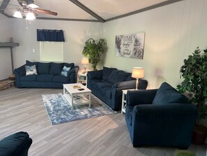 Family Room with Lots of seating included a queen size sleeper sofa