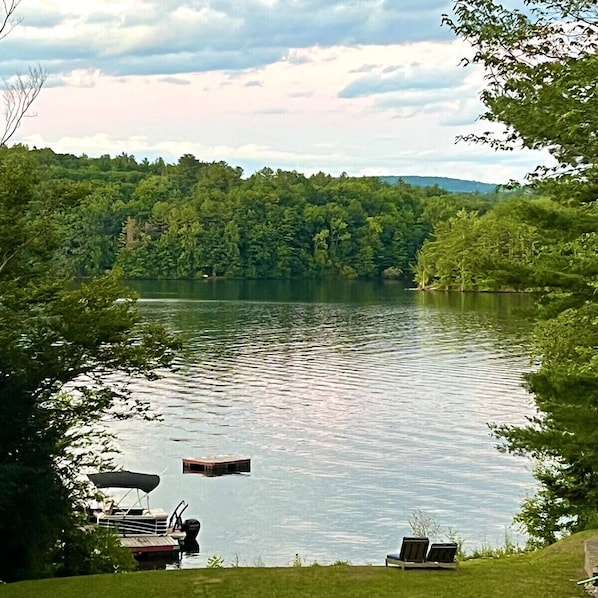 Gorgeous, quiet Burden Lake. We have a pontoon boat that you can reserve, a raft to swim out to, 2 kayaks, 2 stand up paddle boards, and a clean lake to swim in!