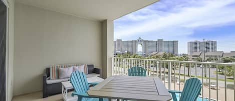 Enjoy beautiful views of the pool from the large, covered patio