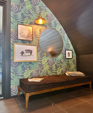 Each Wellness Hut comes with a day bed for a 3rd guest to sleep on.
