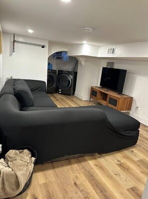Finished basement with laundry area