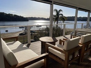 Chill on the deck lounge while your loved ones cook a seafood BBQ for you 😉