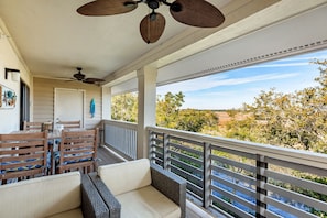 Incredible marsh view from the porch! Imagine yourself relaxing out here after a long day of activities.