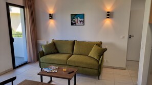 Relax and rejuvenate in the cozy living room.