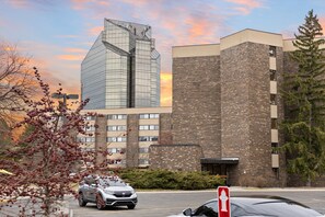 The pathway leading to the building where the unit is located.