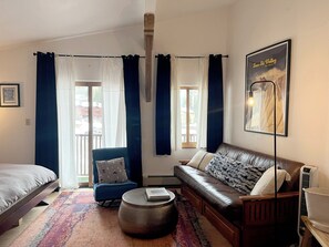 Studio Livingroom with balcony and both privacy and black out curtains