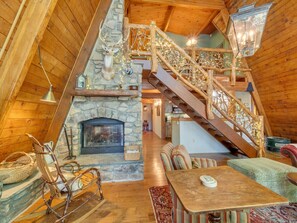 Stone Fireplace with fairytale lights on the beautiful staircase