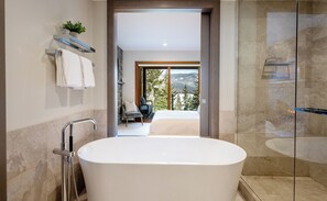 Enjoy mountain and lake views from your deep soaking tub