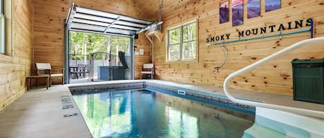 Indoor heated pool w/garage door to patio w/hot tub & bbq! Table for 6 as well.