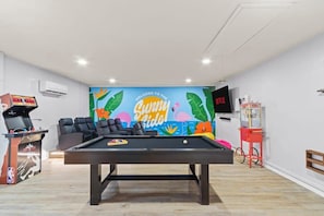 Step into the ultimate game room, where the fun never stops. Challenge friends to a game of pool, try your hand at the arcade, and top it off with fresh popcorn from the machine—a haven for gaming enthusiasts and those looking for a good time.
