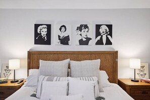 King size bed and pool entry from bedroom 