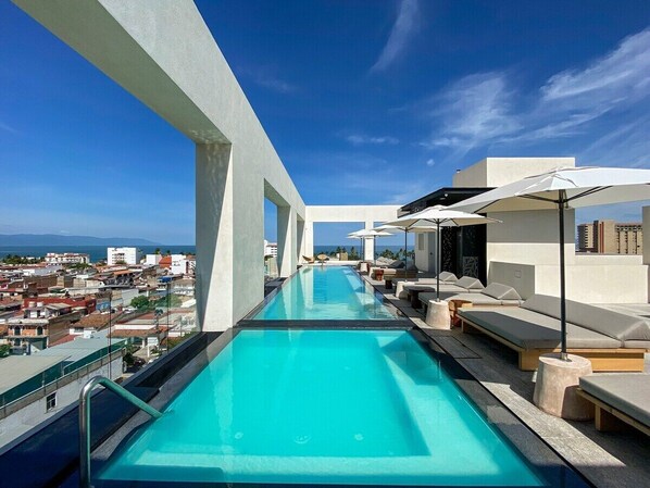 Large rooftop pool and jacuzzi