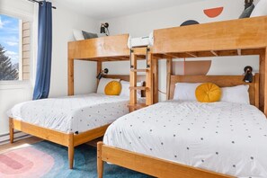 Bedroom 2: 2 connected twin-over-full bunk beds, upper floor