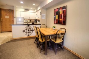 Dining room table, doubles as a convenient work space for those of you who like to work and play!