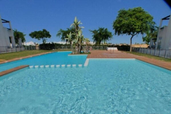 Pool adjacent to apartment 
