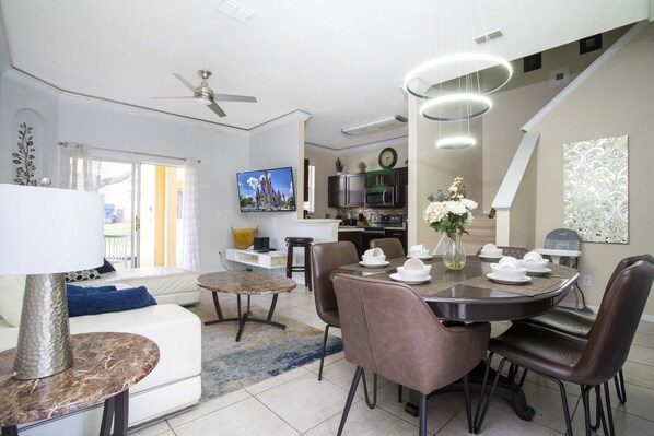 Spacious open-concept living and dining area, perfect for relaxing or enjoying meals together.
