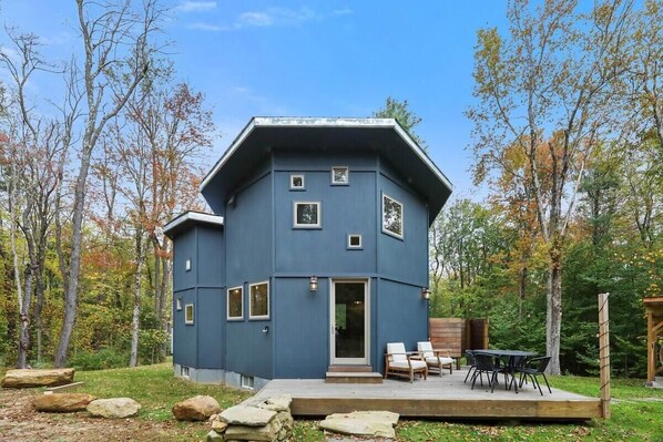 Unique octagonal house with red cedar barrel sauna.