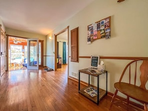 Our entry way is inviting and flows into the living room, kitchen and three seasons room.