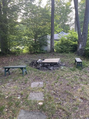 Fire pit behind the cabin 